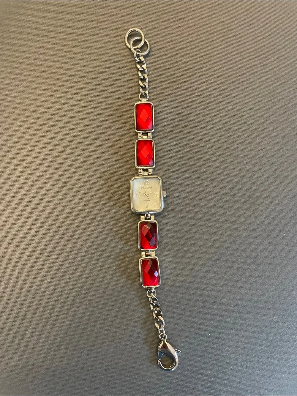Vintage Bay Studio Silver-Tone Bracelet Watch with Red Faceted Stones